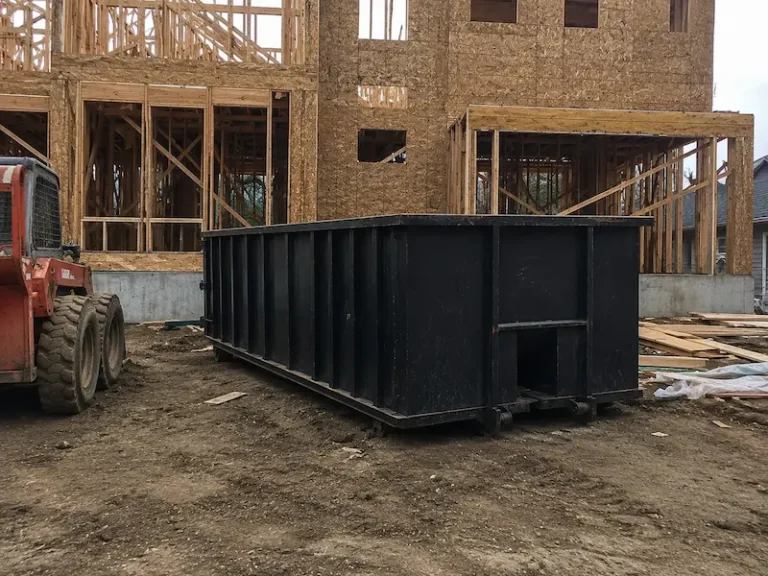 Construction dumpster rental at residential building site in Sugar Land TX