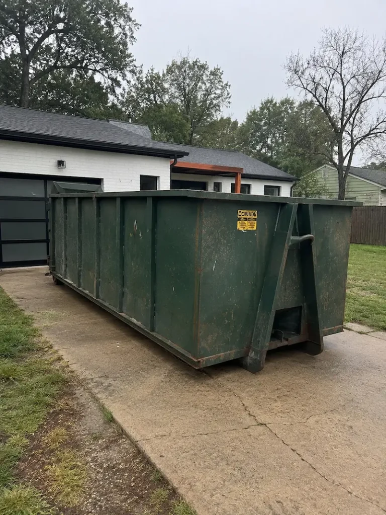 Residential dumpster rental project in Sugar Land TX driveway